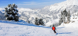 Skier-returning-to-Flaine-la-Foret-sk-village-in-French-Alps-13984.jpg