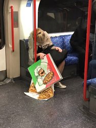 MAIN-Drunk-woman-tube-pizza (1).jpg