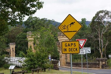 8371e006-6662-4645-85f8-ffcaddd8b2b0-funny-road-sign-australia-shutterstock.jpg