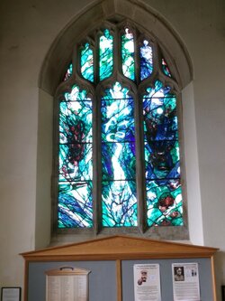 230908-2574 Slimbridge St John Peter Scott memorial stained glass.JPG